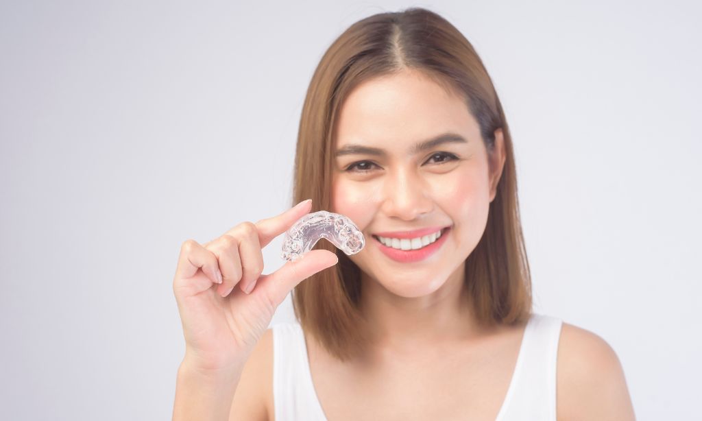 Transform Your Smile with Invisalign at Woodstock’s Spark Dental.